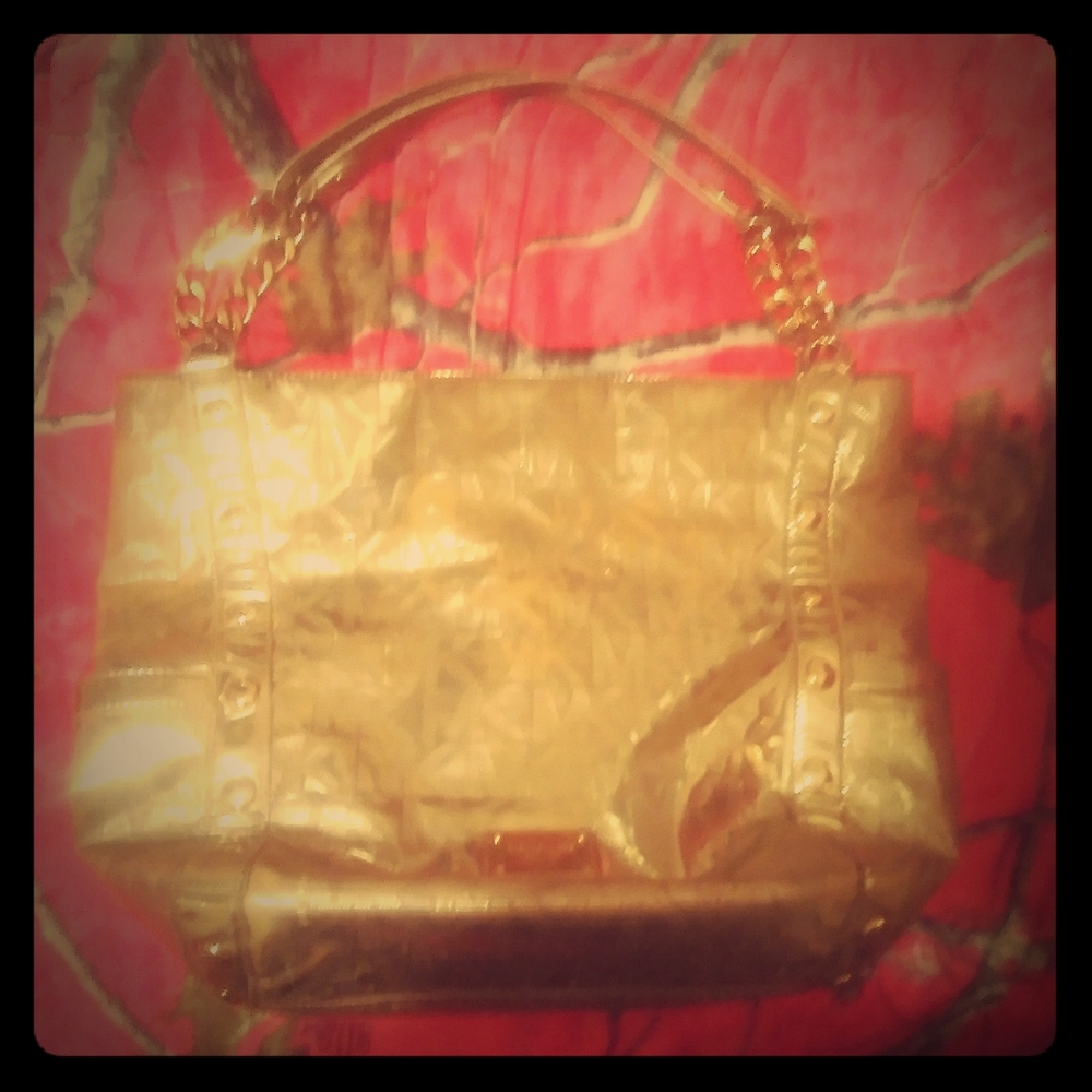 Michael kors metallic hand bag tote